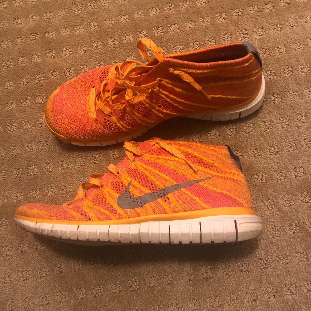 Orange and pink nike chukka shoes